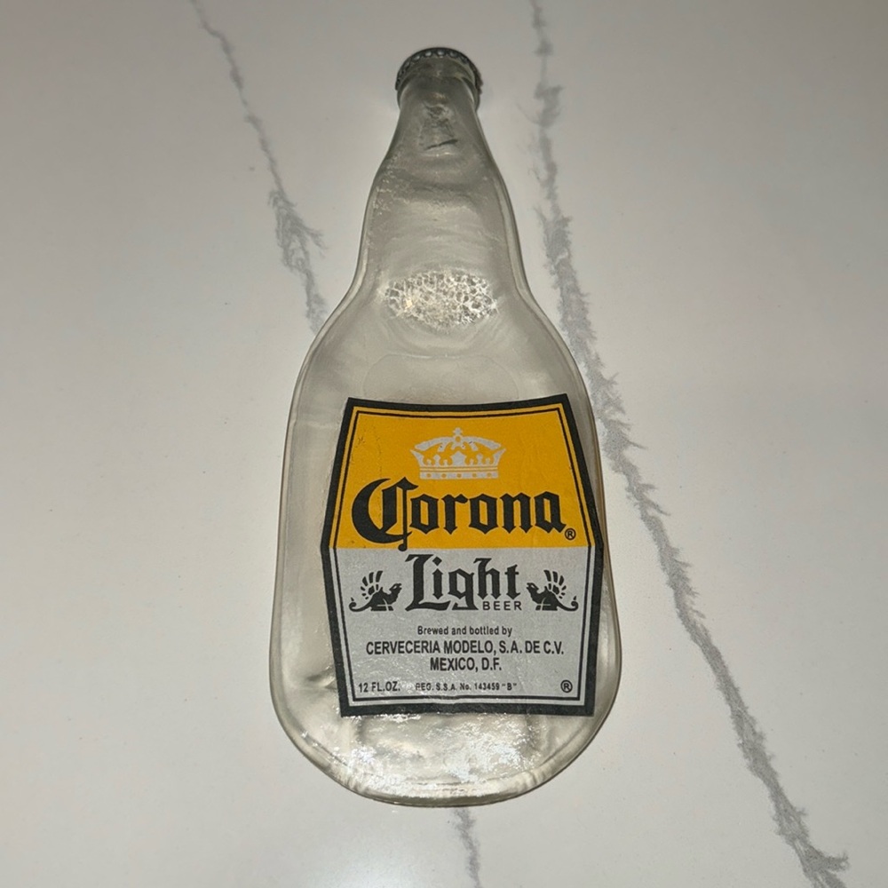 CORONA LIGHT BEER MELTED BOTTLE